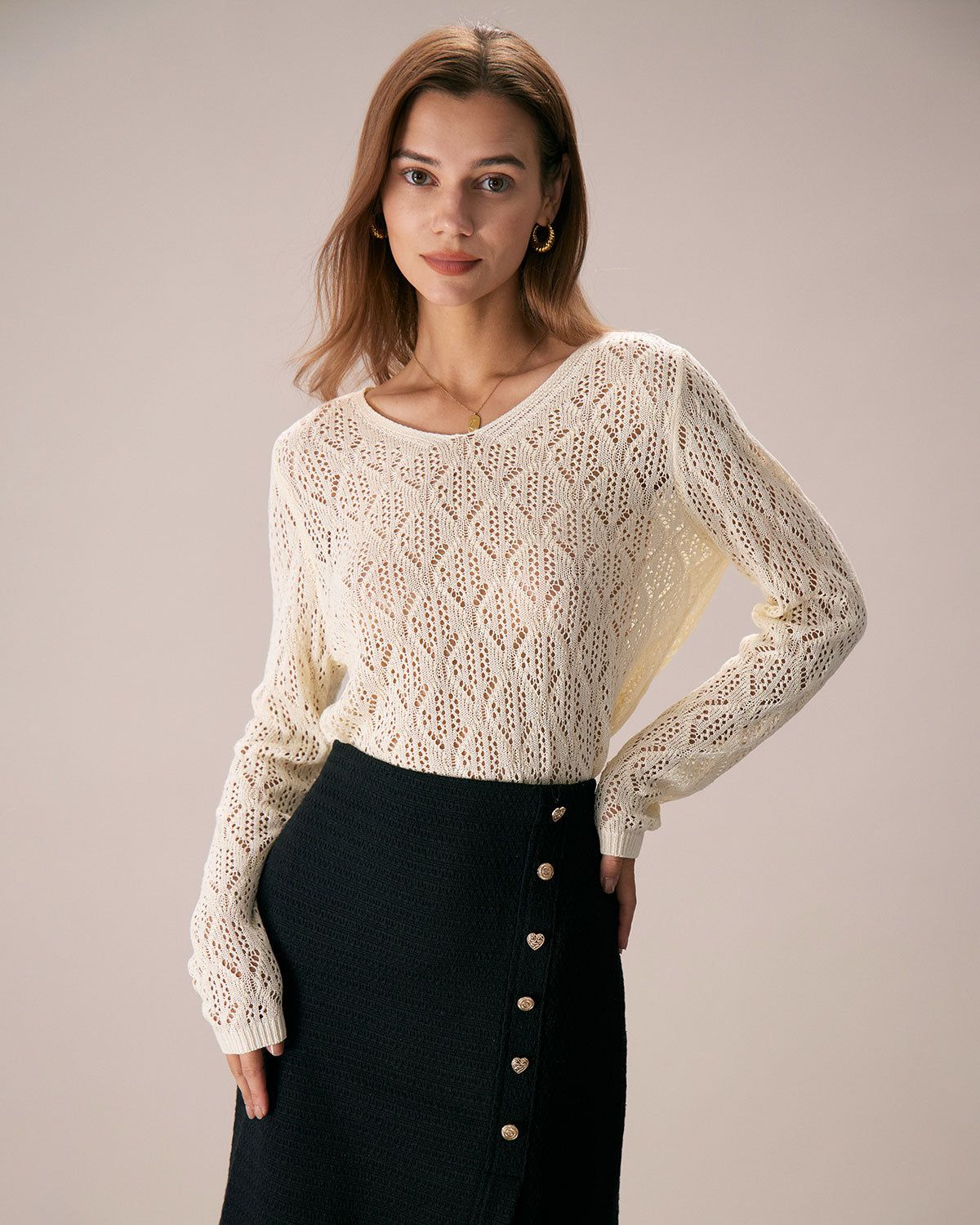 The Apricot V Neck Pointelle Mesh Knit Top sold by rihoas