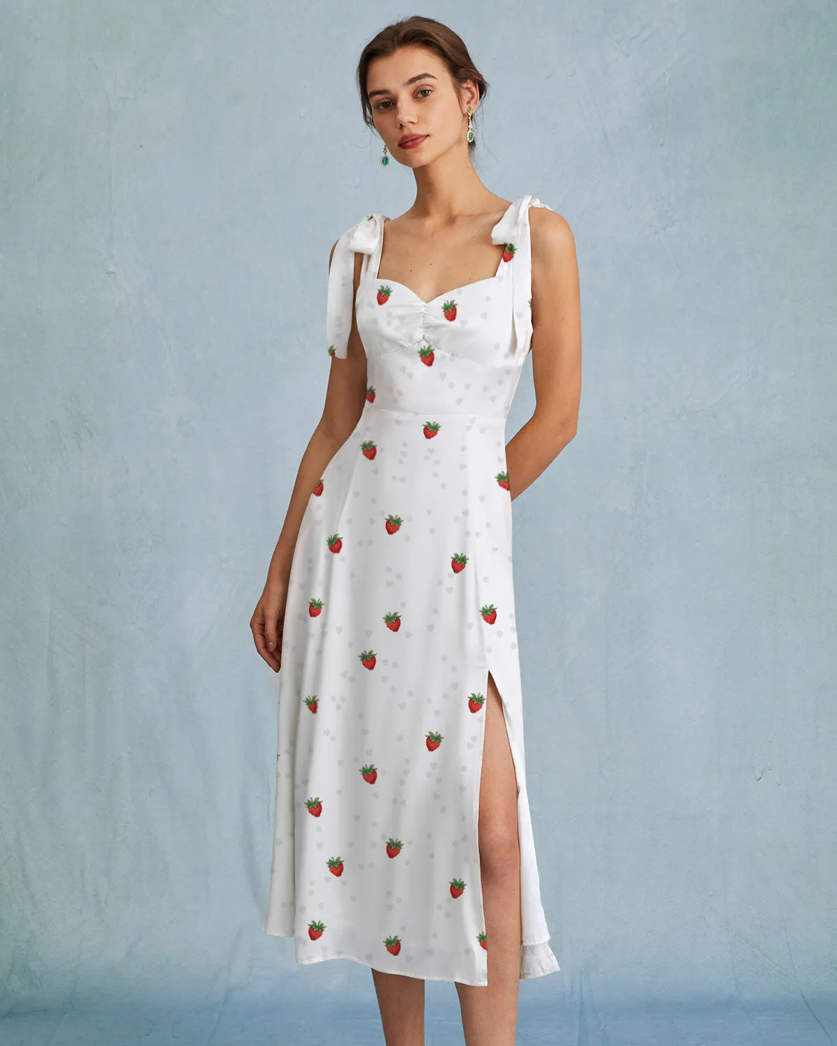 The White Strawberry Tie Strap Slit Midi Dress sold by rihoas