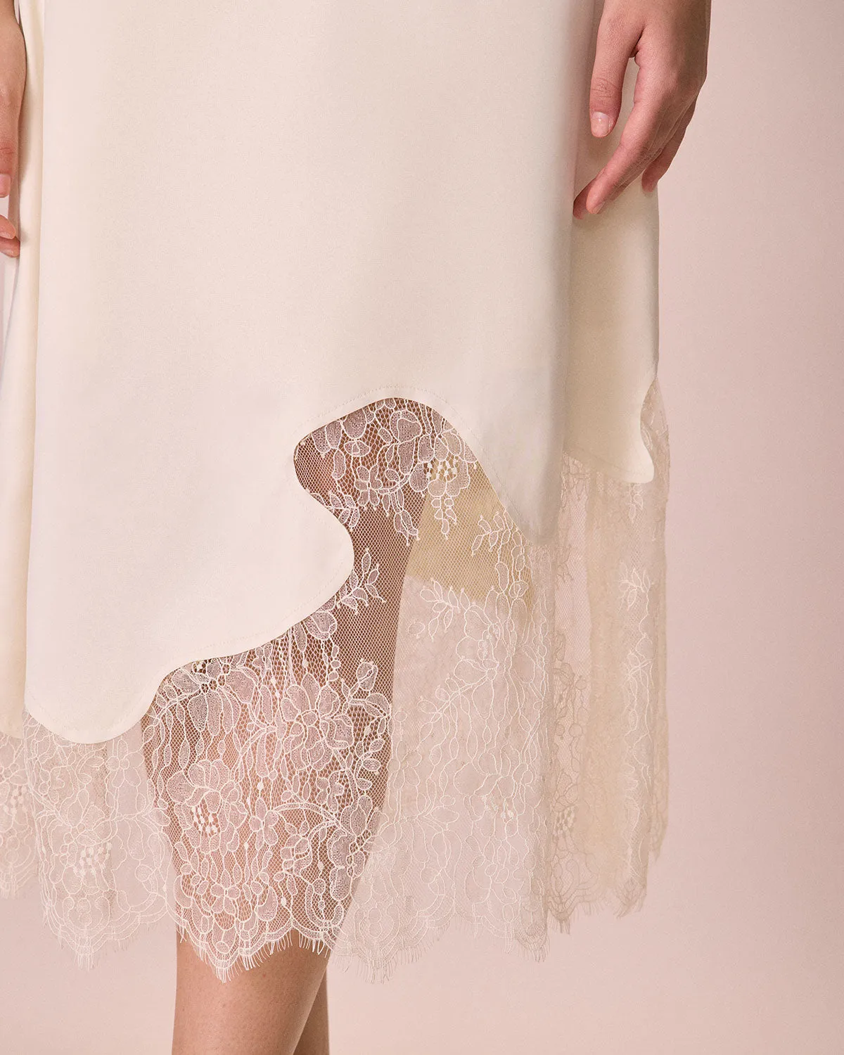 The Beige High-Waisted Irregular Satin Midi Skirt sold by rihoas product image thumbnail 2