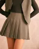 The Khaki Elastic Waist Pleated Mini Skirt sold by rihoas