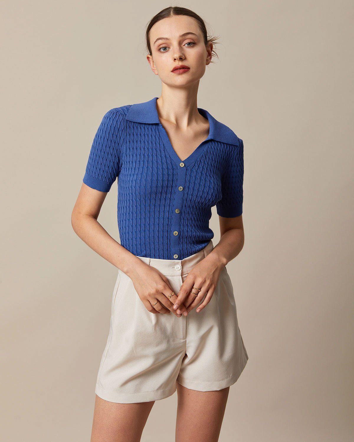 The Navy V Neck Pointelle Ribbed Knit Top sold by rihoas