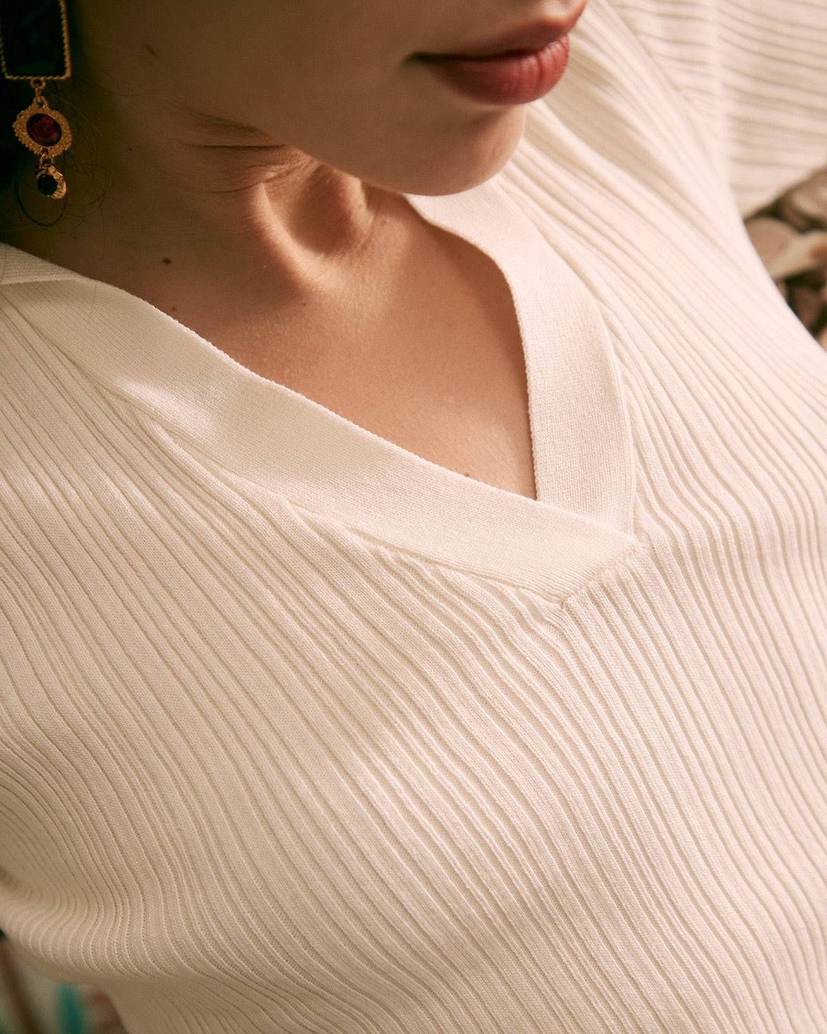 The White V Neck Side Slit Bodycon Midi Dress sold by rihoas product image thumbnail 2