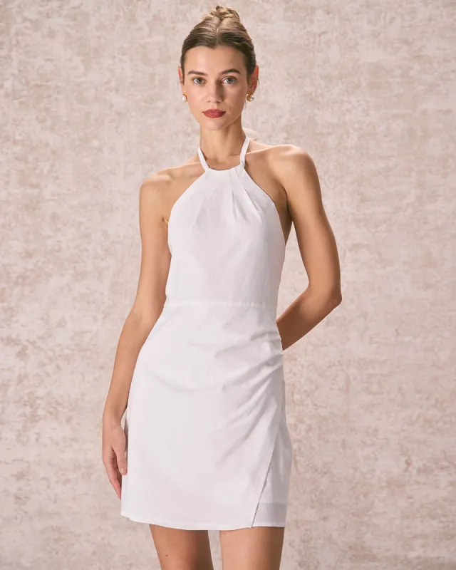 The White Ruched Halter Mini Dress sold by rihoas
