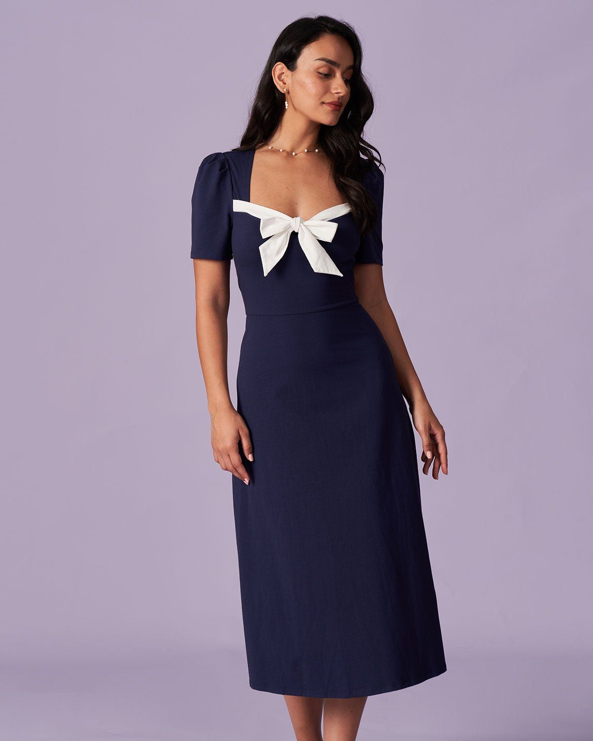 The Navy Sweetheart Neck Tie Front Midi Dress sold by rihoas