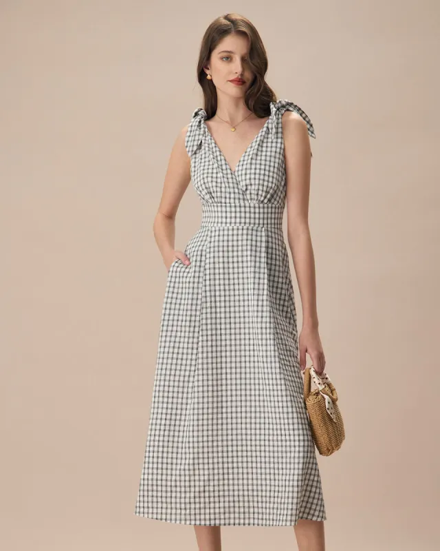 The Black V-Neck Plaid Tie Strap Cotton Midi Dress sold by rihoas