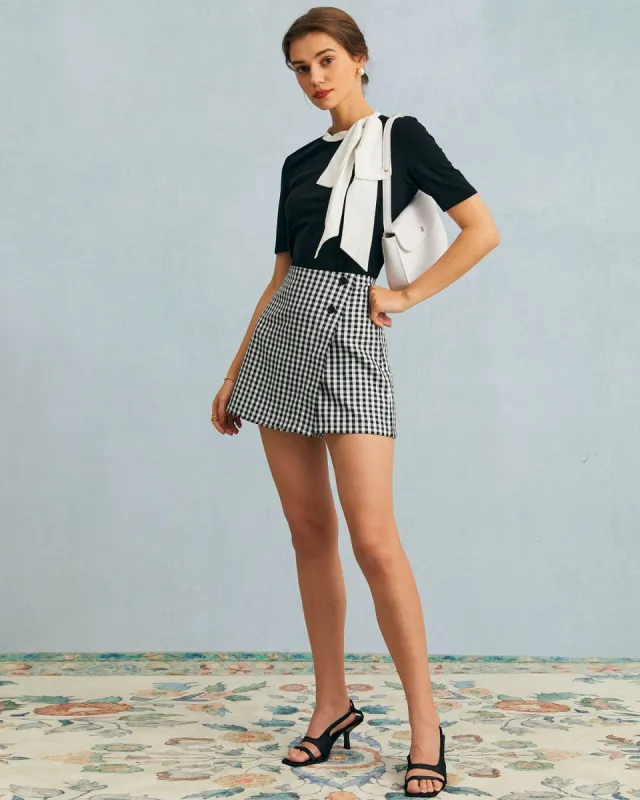 The Black High Waisted Plaid Button Mini Skort sold by rihoas