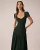 The Black Sweetheart Neck Polka Dot Maxi Dress sold by rihoas