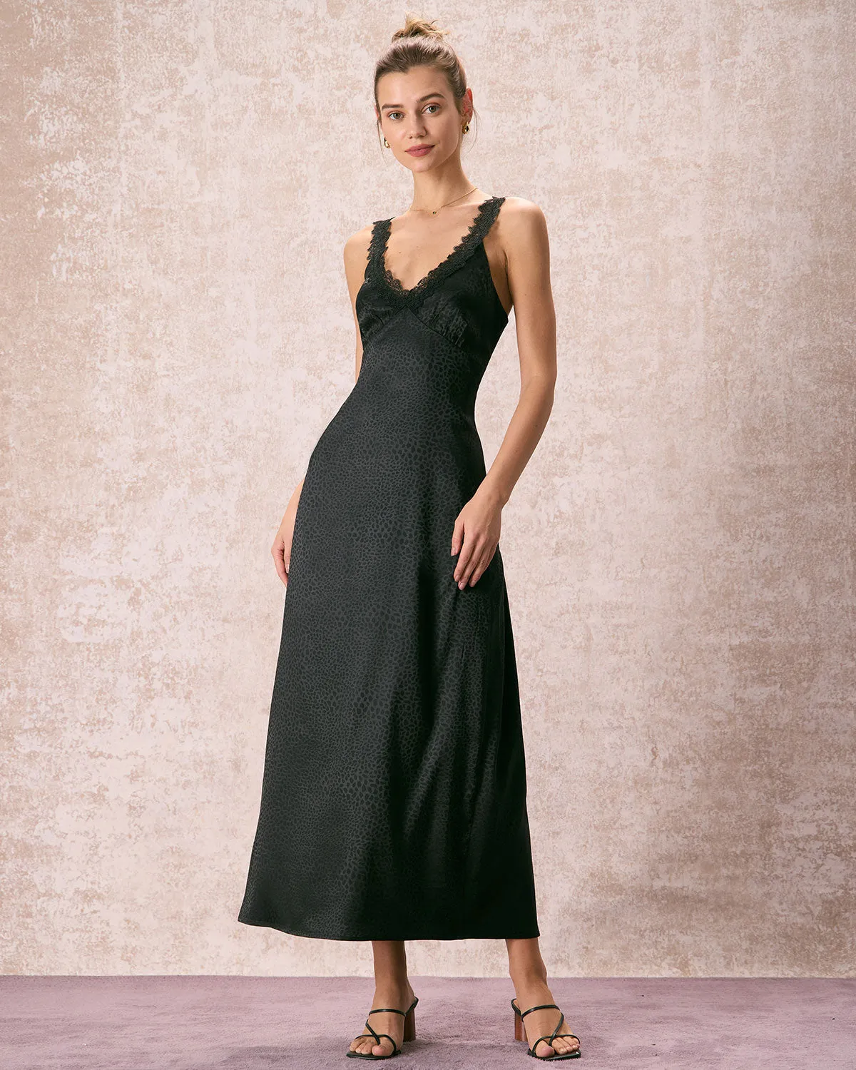 The Black V Neck Lace Jacquard Maxi Dress sold by rihoas