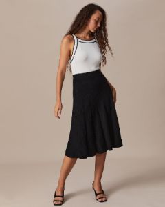 The Black High Waisted Textured Knit Midi Skirt sold by rihoas