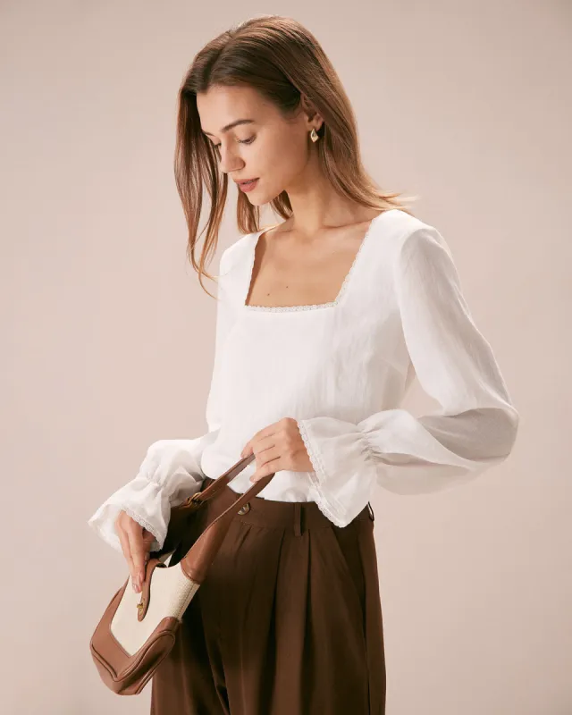 The White Square Neck Poet Sleeve Blouse sold by rihoas