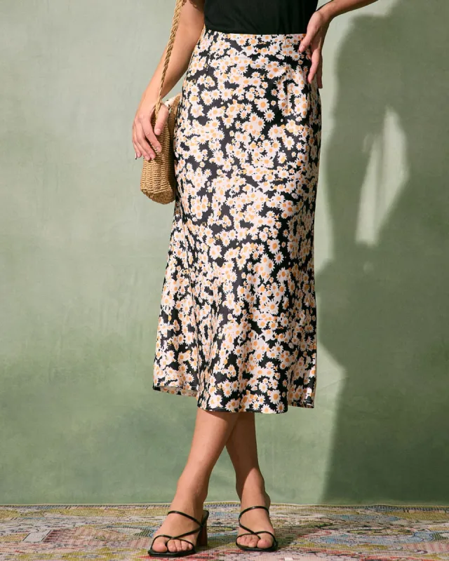 The Black High-Waisted Daisy Floral Midi Skirt sold by rihoas