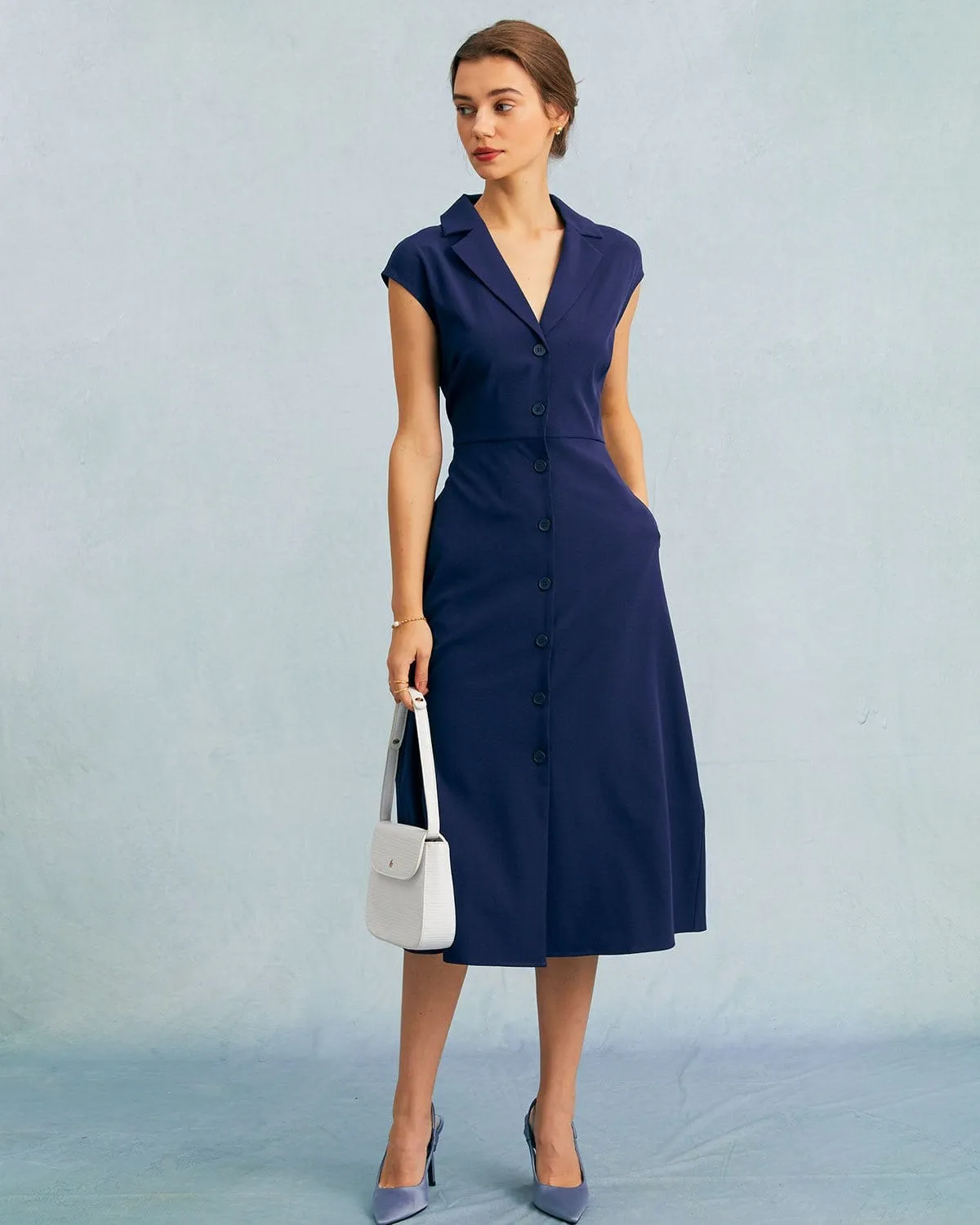 The Navy V Neck Button Cap Sleeve Midi Dress sold by rihoas