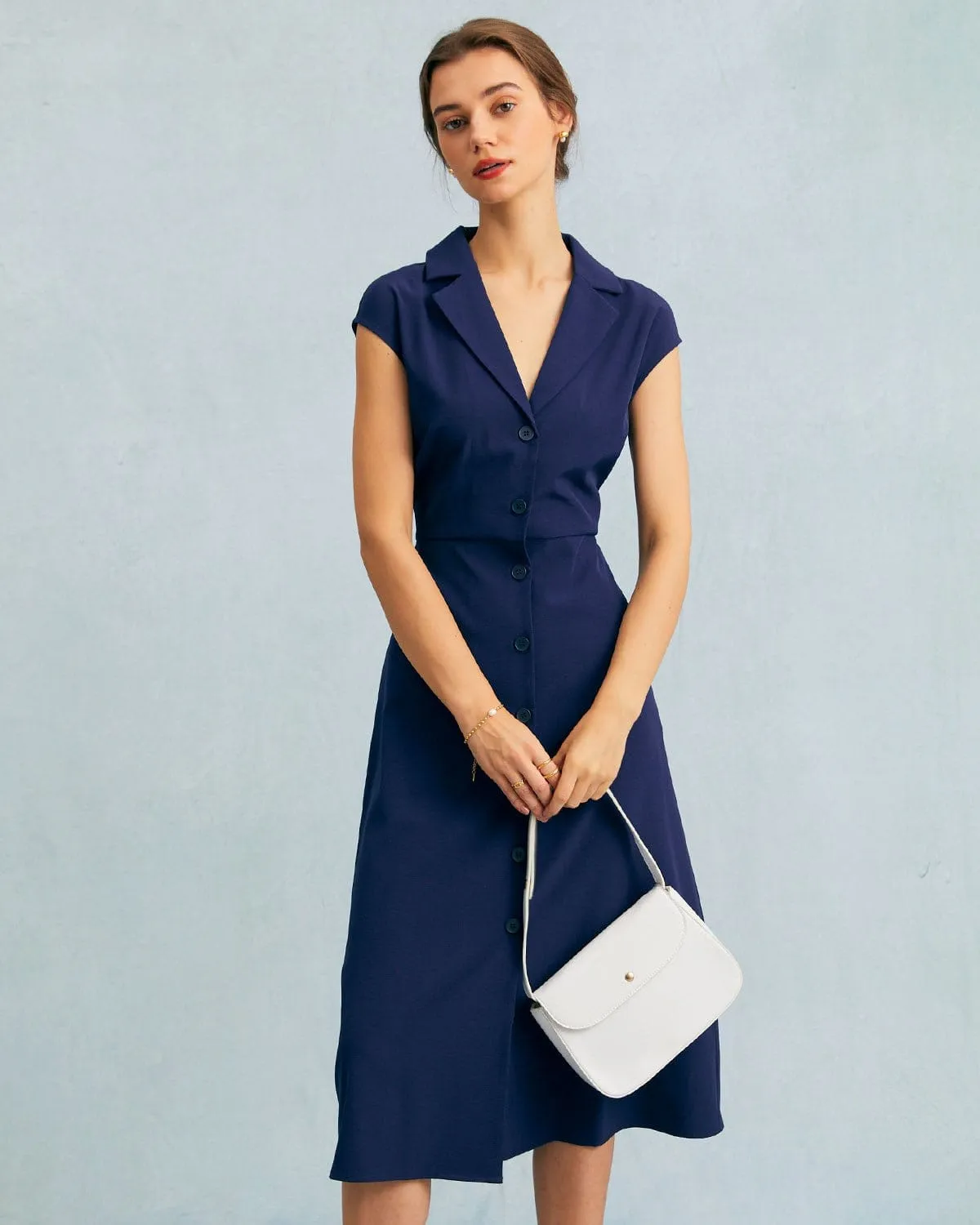 The Navy V Neck Button Cap Sleeve Midi Dress sold by rihoas product image thumbnail 2