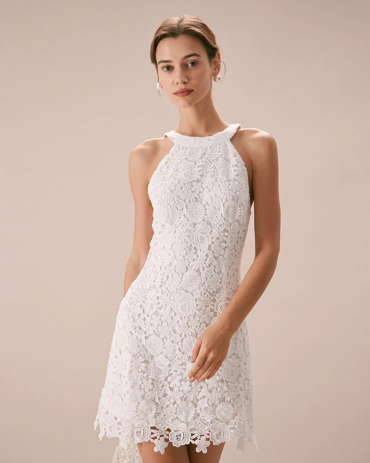 The White Halter Lace Sheath Mini Dress sold by rihoas