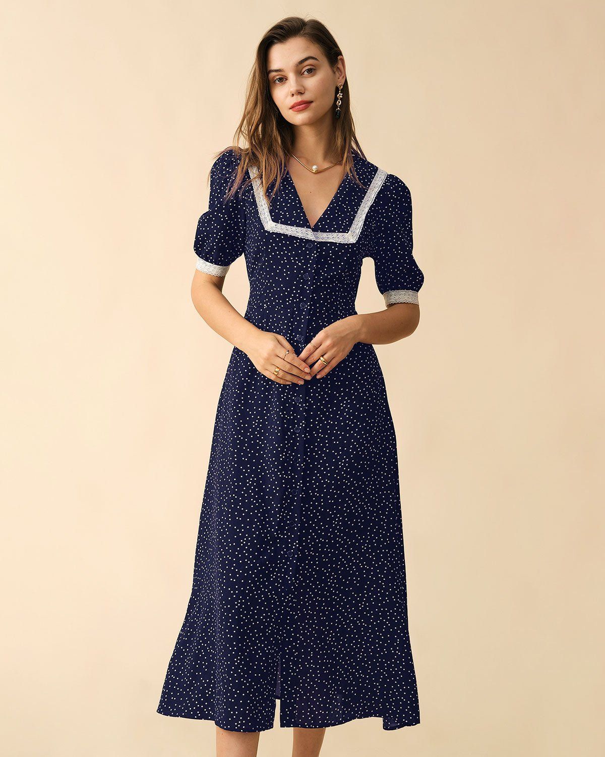 The Navy Polka Dot Lace Trim Midi Dress sold by rihoas