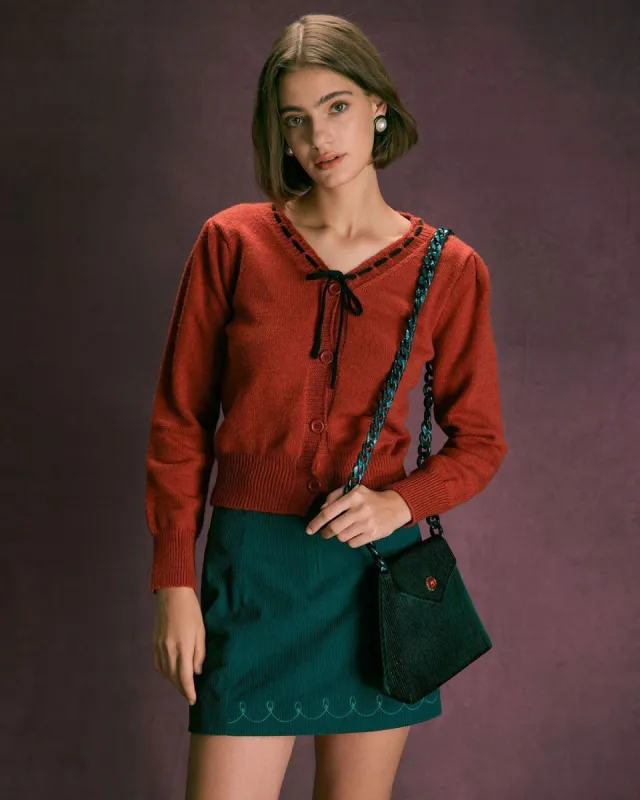 The Solid Tie Neck Ribbed Button Cardigan sold by rihoas