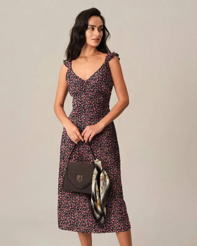 The Tulip Print Backless Midi Dress sold by rihoas