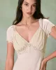 The Apricot V Neck Ruched Satin Midi Dress sold by rihoas