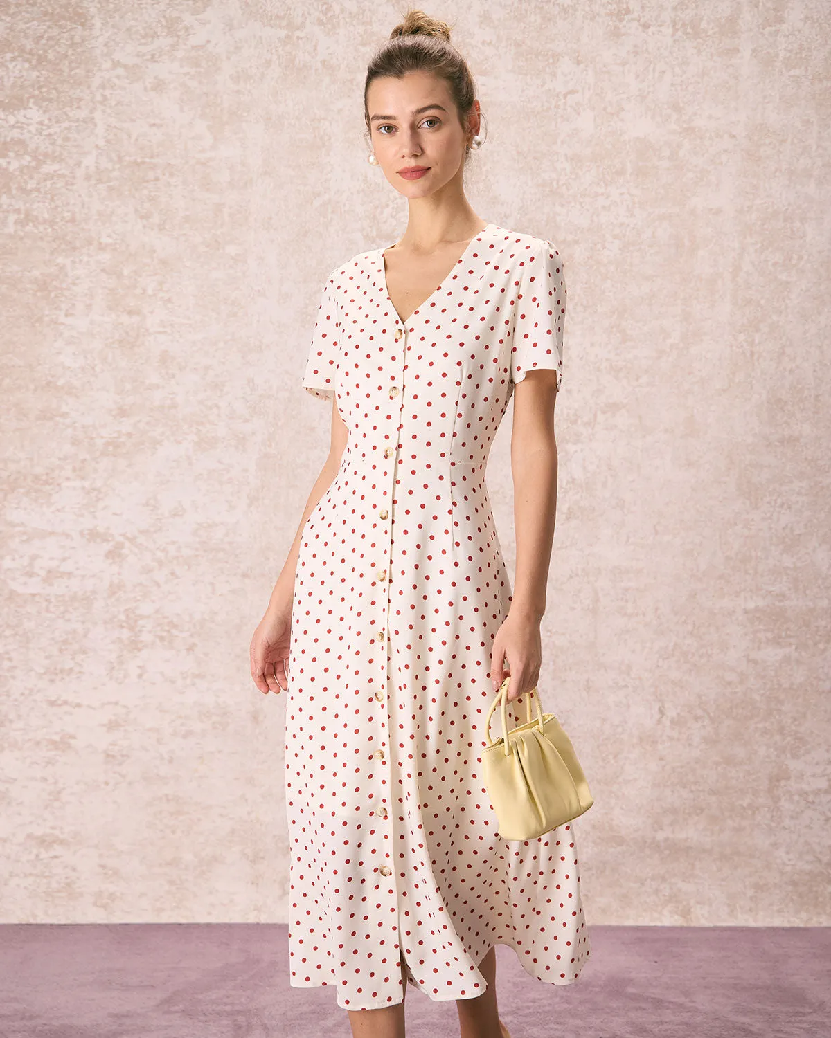 The Beige V Neck Polka Dot Button Midi Dress sold by rihoas