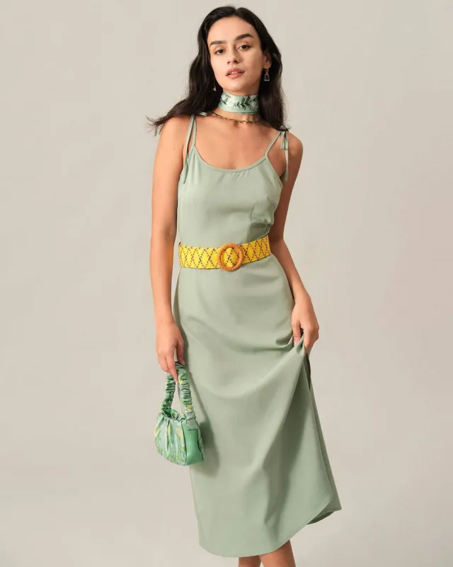 The Solid Tie Strap Midi Dress sold by rihoas