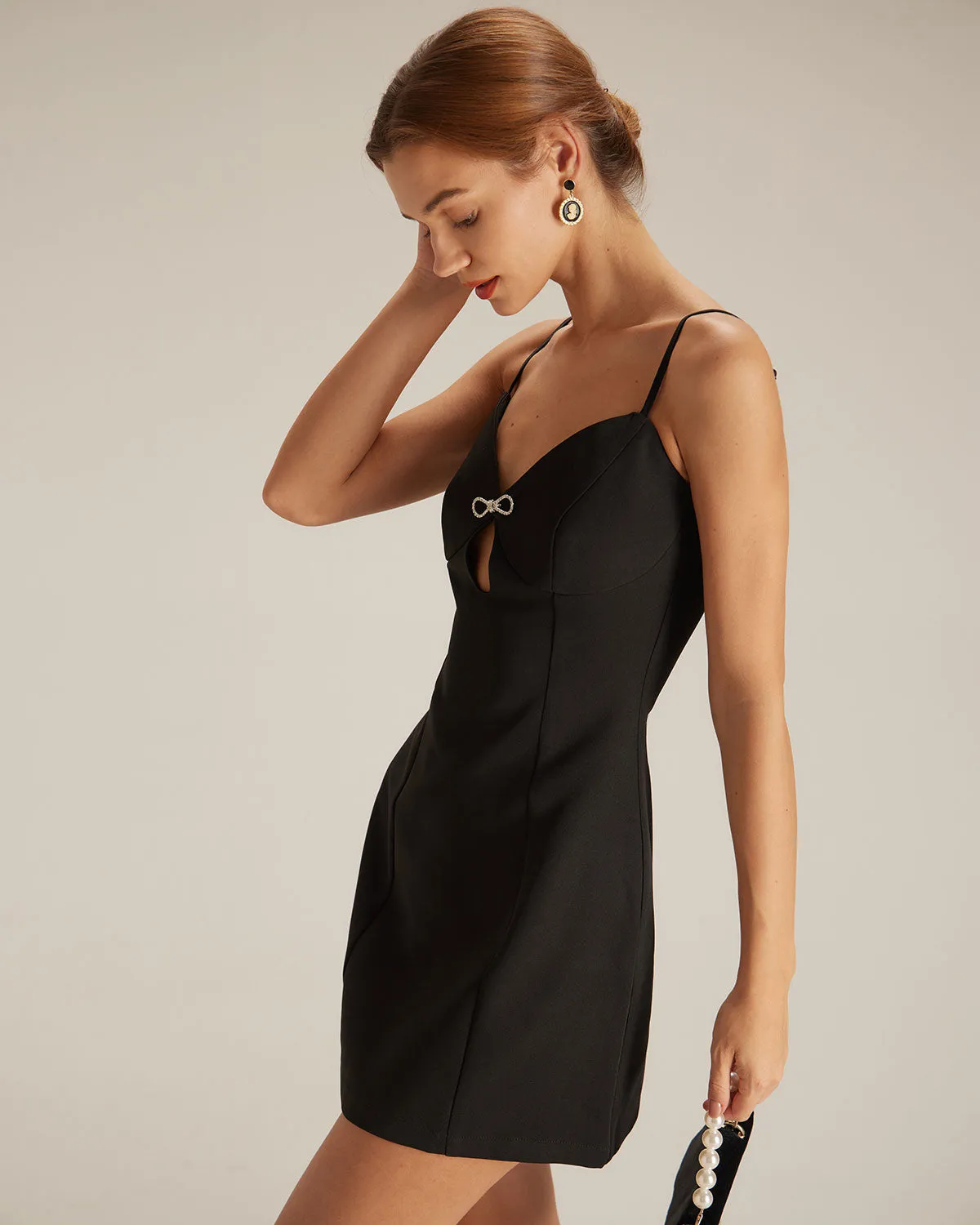 The Black V Neck Cutout Sleeveless Mini Dress sold by rihoas product image thumbnail 4