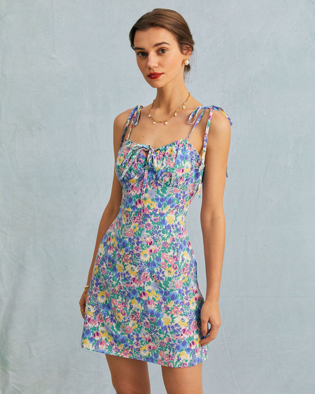 The Multi Floral Ruffle Sleeveless Slip Mini Dress sold by rihoas