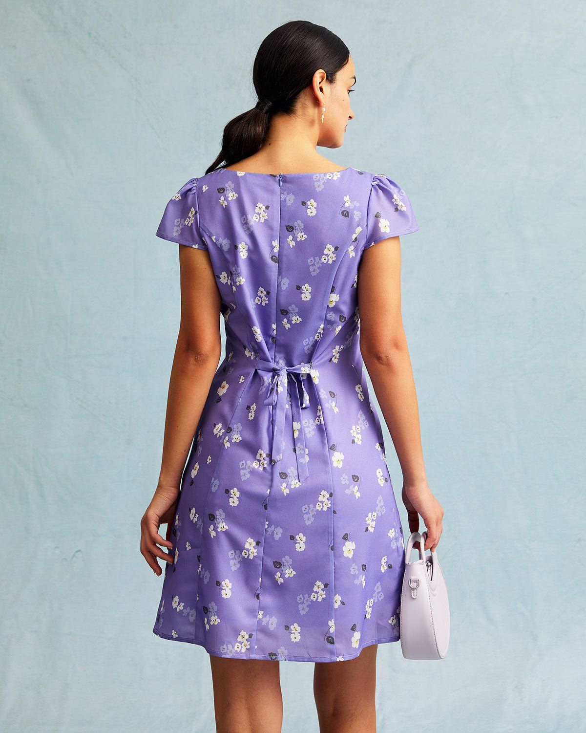 The Purple Floral Tie Back Cap Sleeve Mini Dress sold by rihoas product image thumbnail 5
