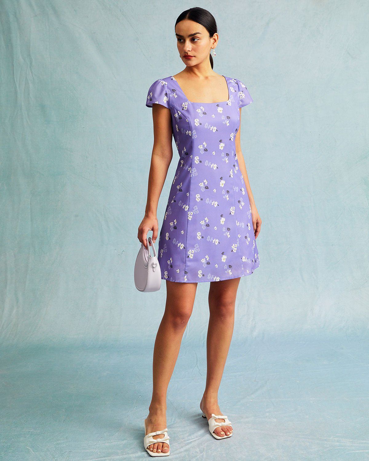 The Purple Floral Tie Back Cap Sleeve Mini Dress sold by rihoas product image thumbnail 3
