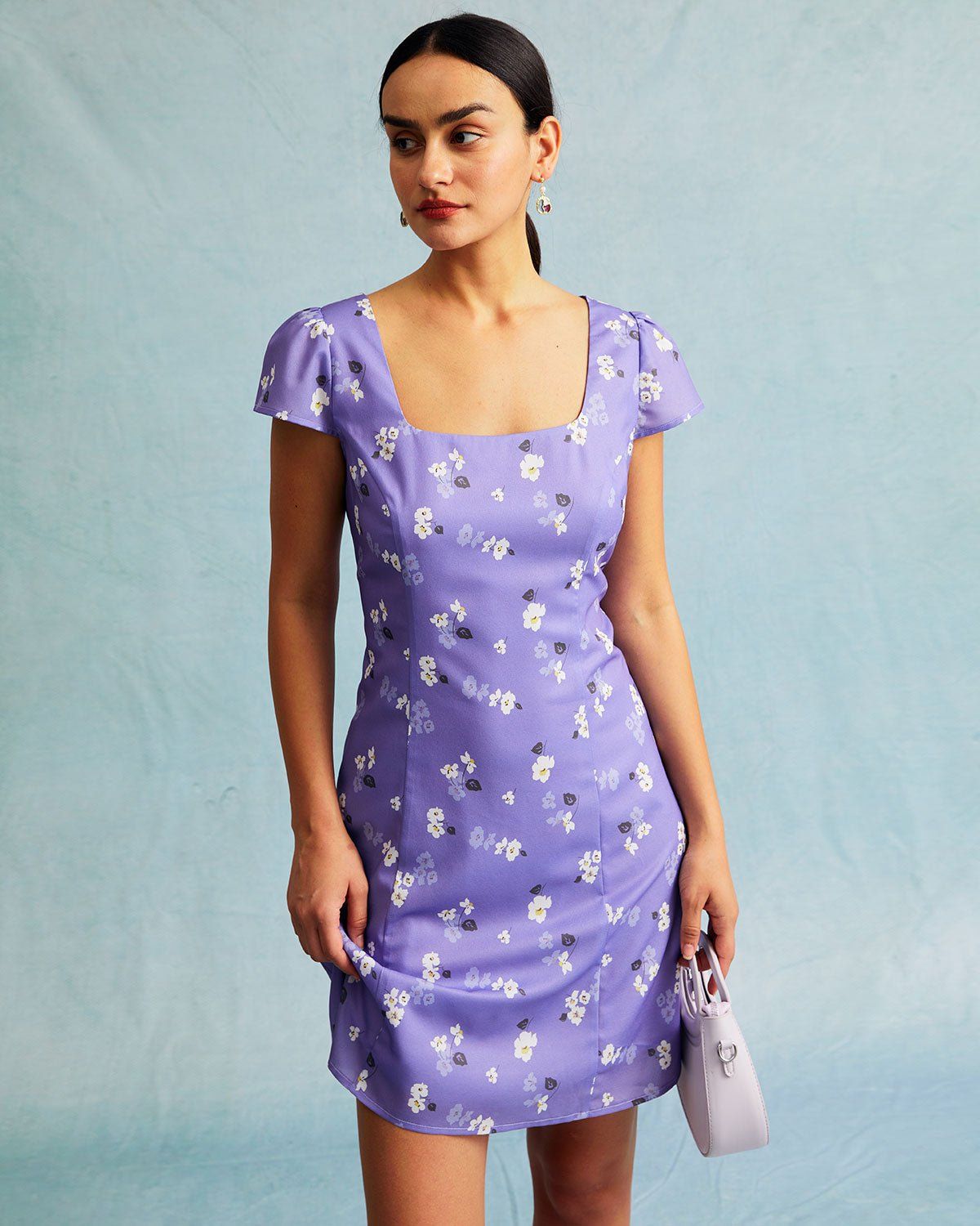 The Purple Floral Tie Back Cap Sleeve Mini Dress sold by rihoas