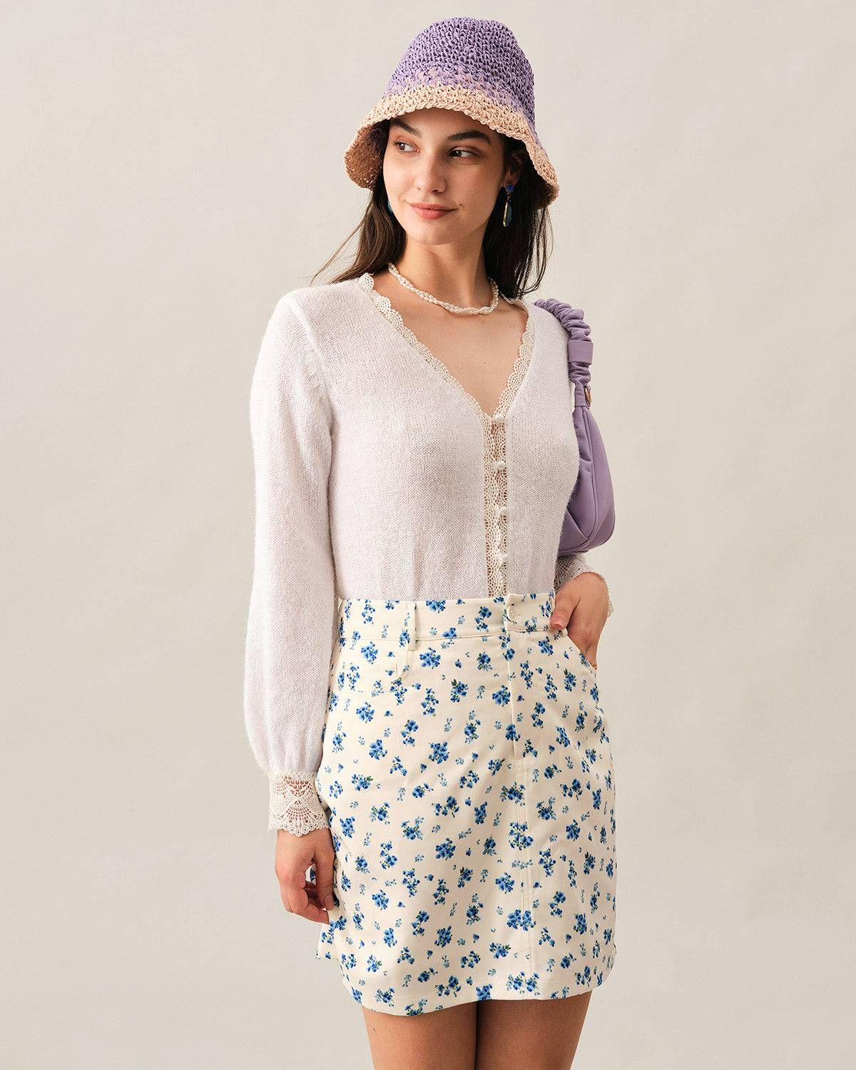 The Lace Trim Pearl Single-breasted Knit Top sold by rihoas