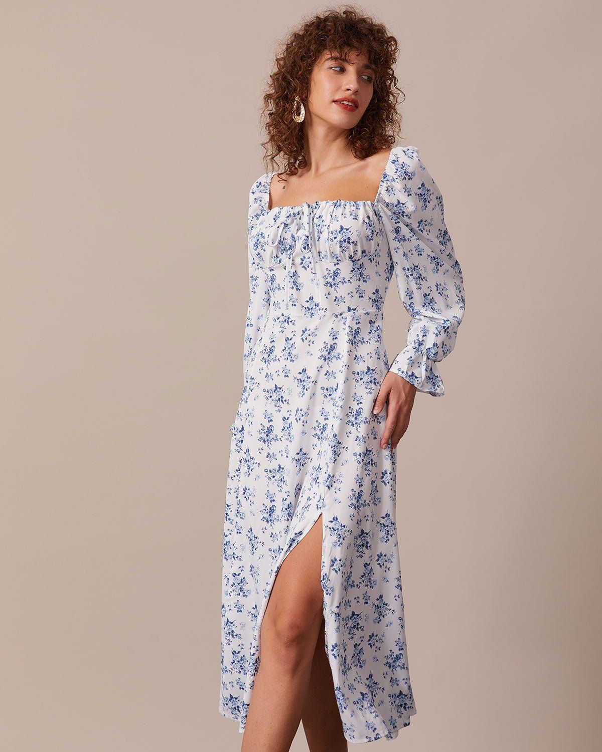 The Blue Floral Ruched Puff Sleeve Midi Dress sold by rihoas product image thumbnail 3