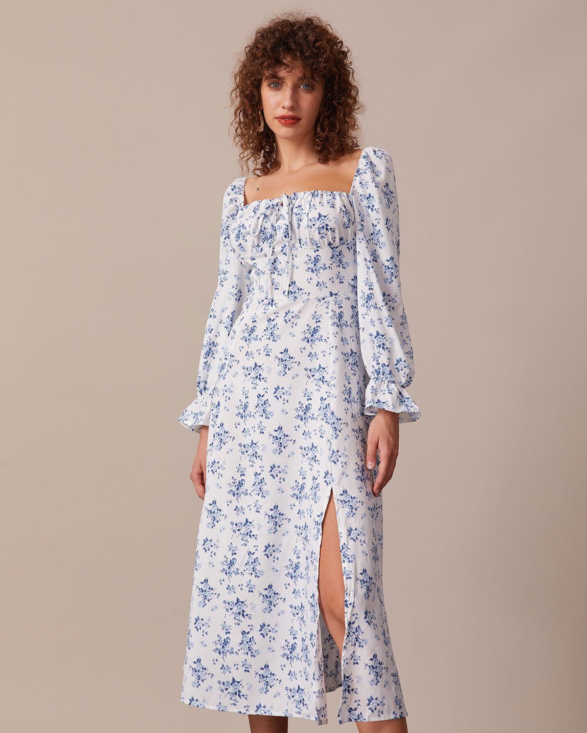 The Blue Floral Ruched Puff Sleeve Midi Dress sold by rihoas product image thumbnail 2