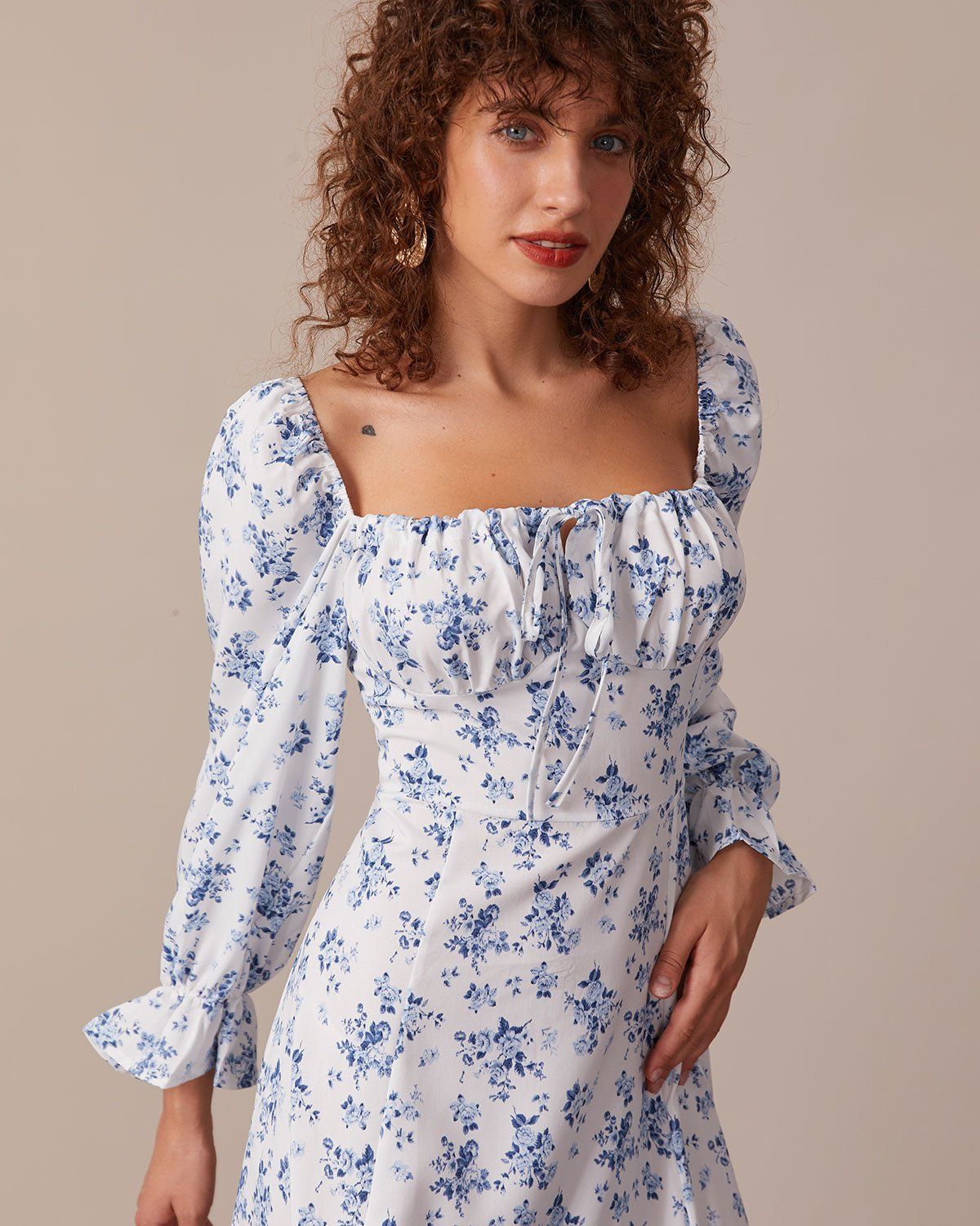 The Blue Floral Ruched Puff Sleeve Midi Dress sold by rihoas product image thumbnail 4