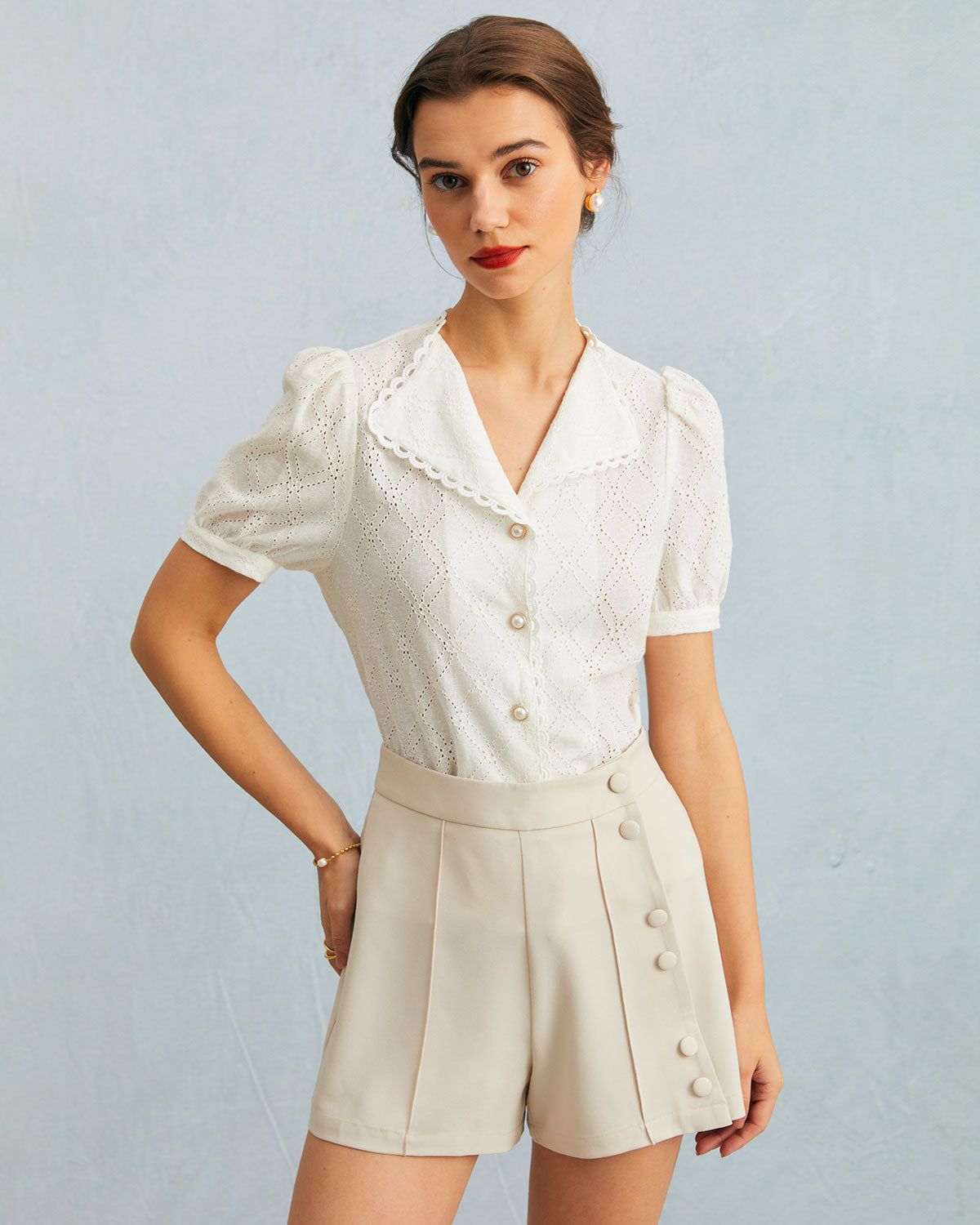 The White V Neck Lace Eyelet Embroidery Blouse sold by rihoas