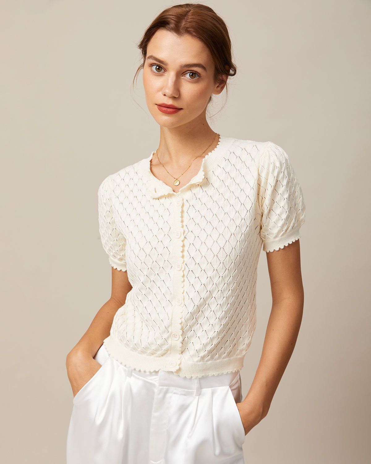 The Beige Puff Sleeve Pointelle Knit Top sold by rihoas