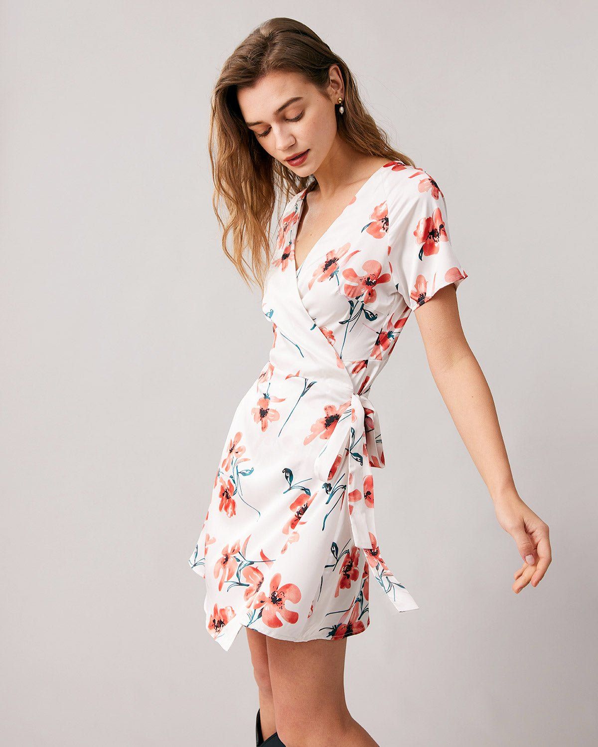 The V Neck Floral Short Sleeve Wrap Mini Dress sold by rihoas product image thumbnail 4