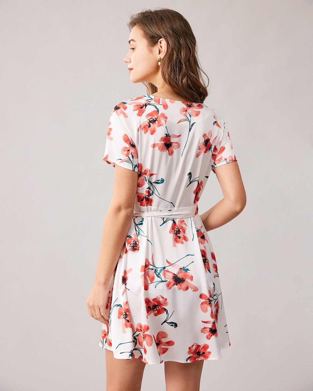 The V Neck Floral Short Sleeve Wrap Mini Dress sold by rihoas product image thumbnail 5