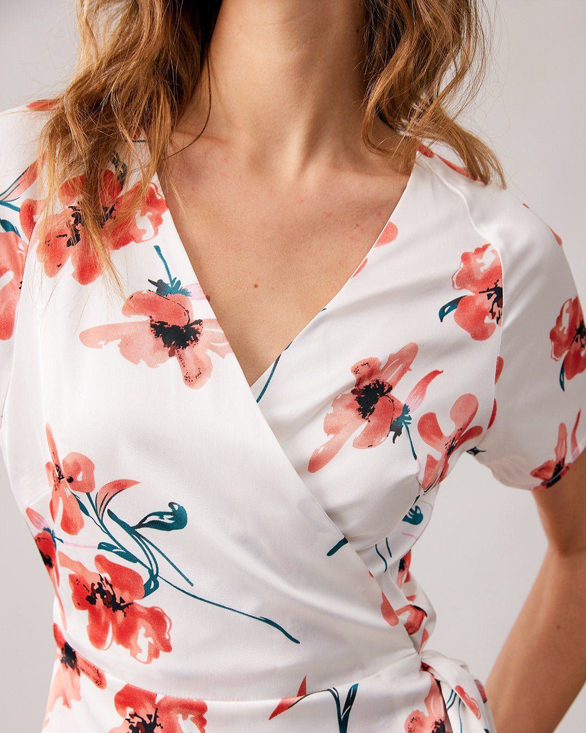 The V Neck Floral Short Sleeve Wrap Mini Dress sold by rihoas product image thumbnail 2