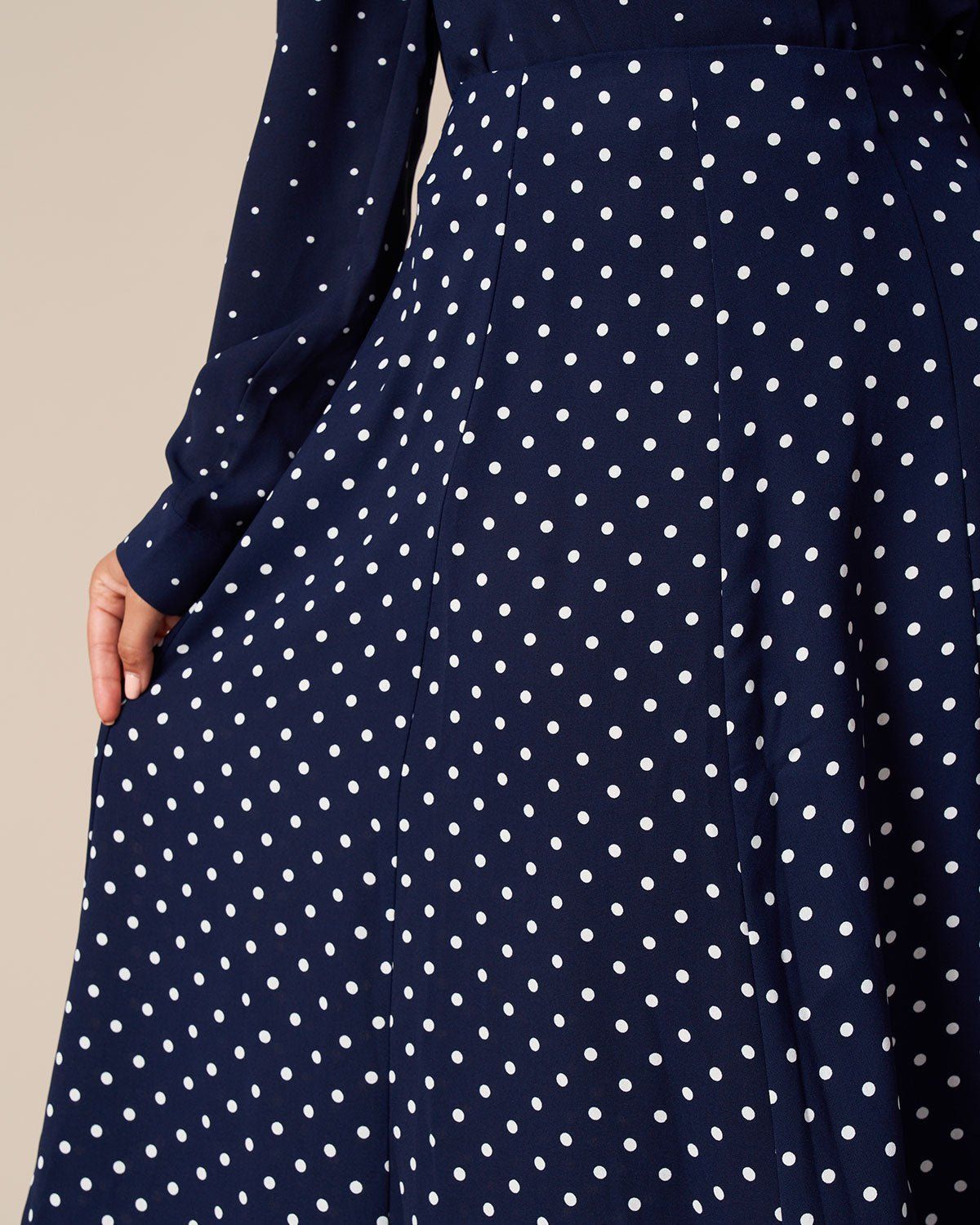 The Navy High Waisted Polka Dot Midi Skirt sold by rihoas product image thumbnail 3