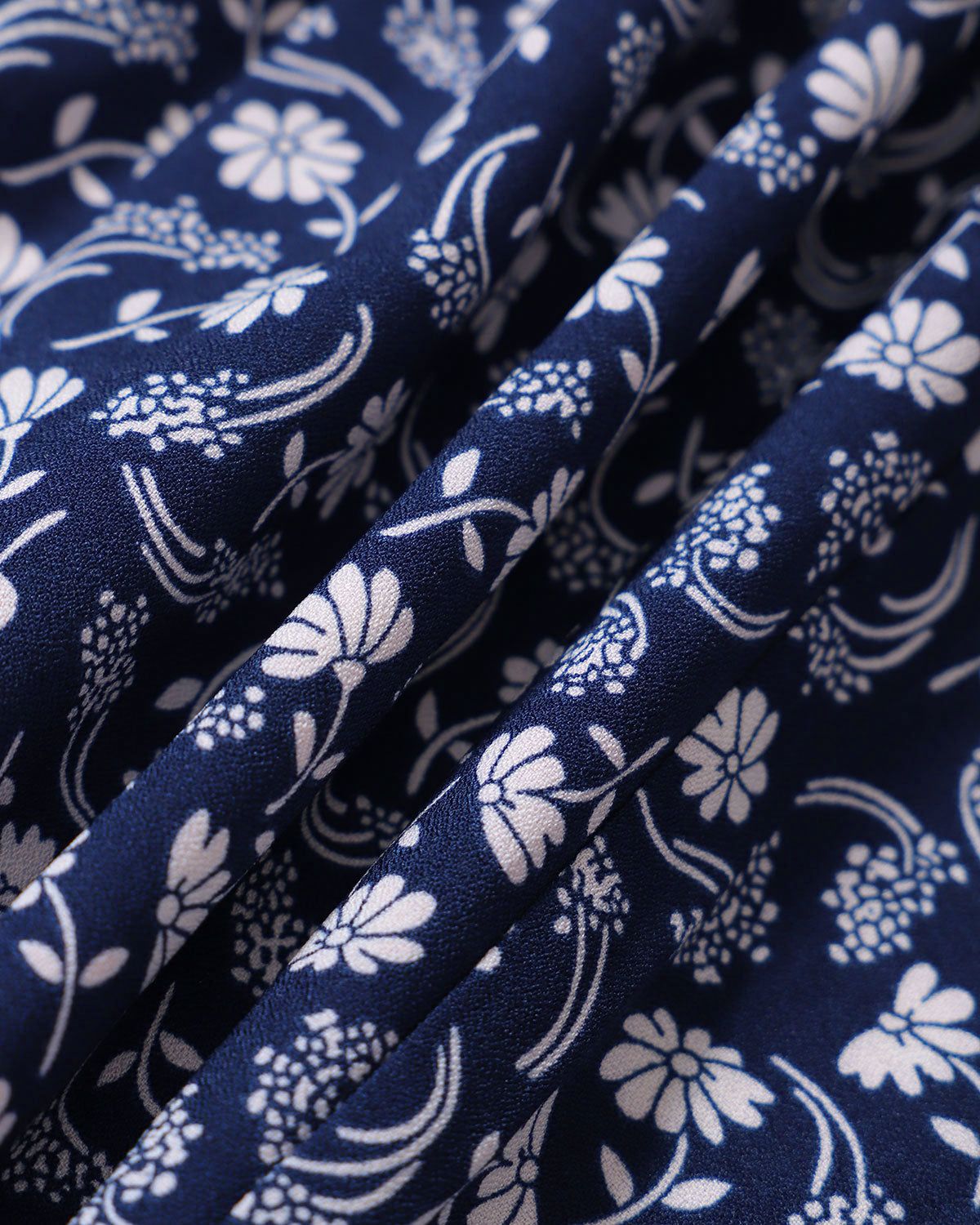 The Navy Floral Cutout Cap Sleeve Midi Dress sold by rihoas product image thumbnail 2