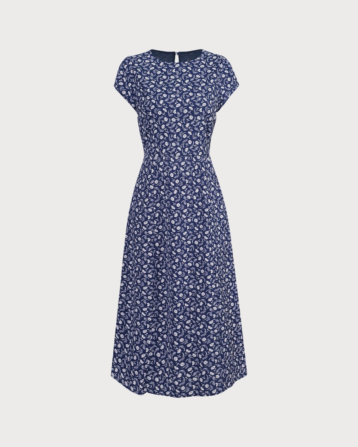 The Navy Floral Cutout Cap Sleeve Midi Dress sold by rihoas