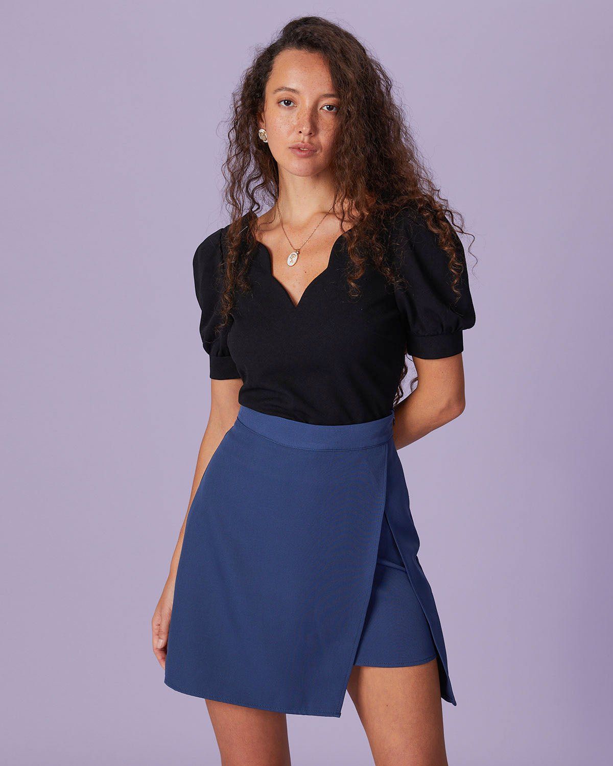 The Black V Neck Scalloped Puff Sleeve Blouse sold by rihoas