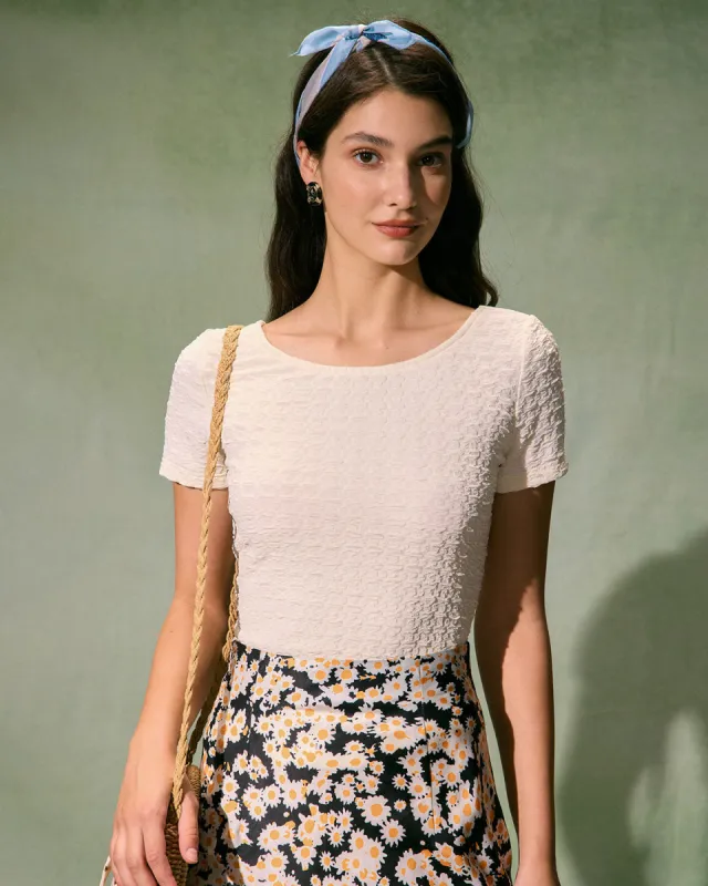 The Beige Round Neck Textured Knit Tee sold by rihoas