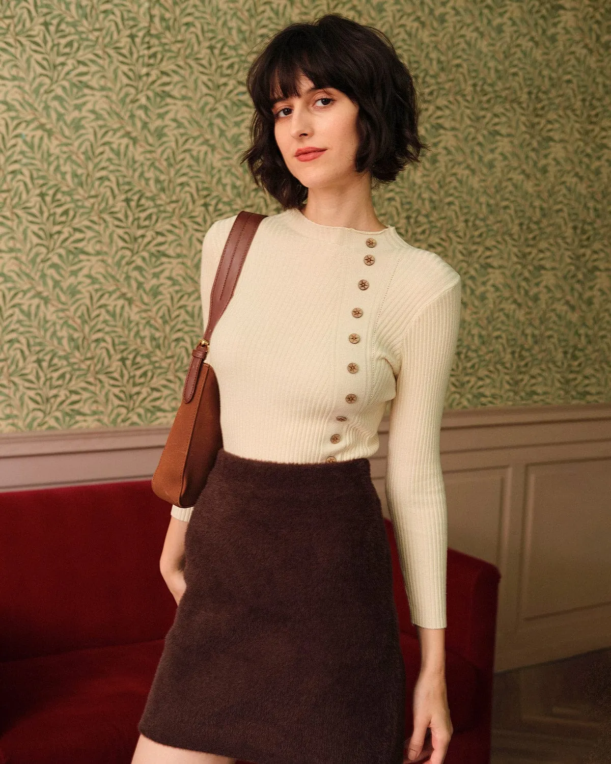 The Beige Mock Neck Ribbed Knit Top sold by rihoas