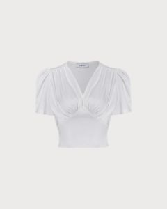 The White Puff Sleeve V Neck Ruched Blouse sold by rihoas