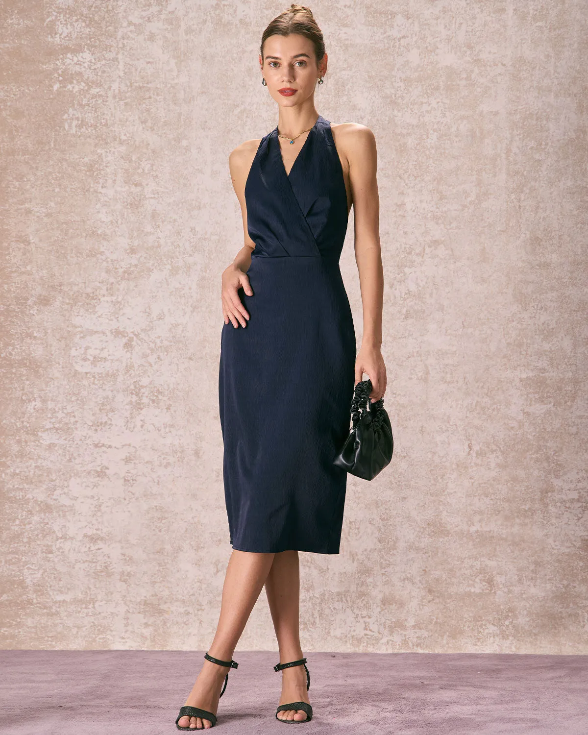 The Navy Halter Ruched Wrap Satin Midi Dress sold by rihoas