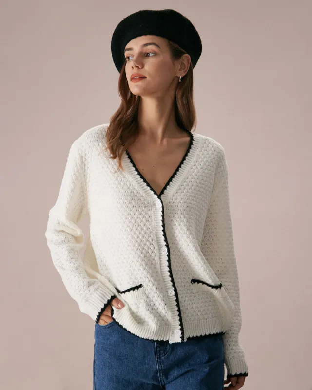 The Beige V Neck Button Pointelle Cardigan sold by rihoas