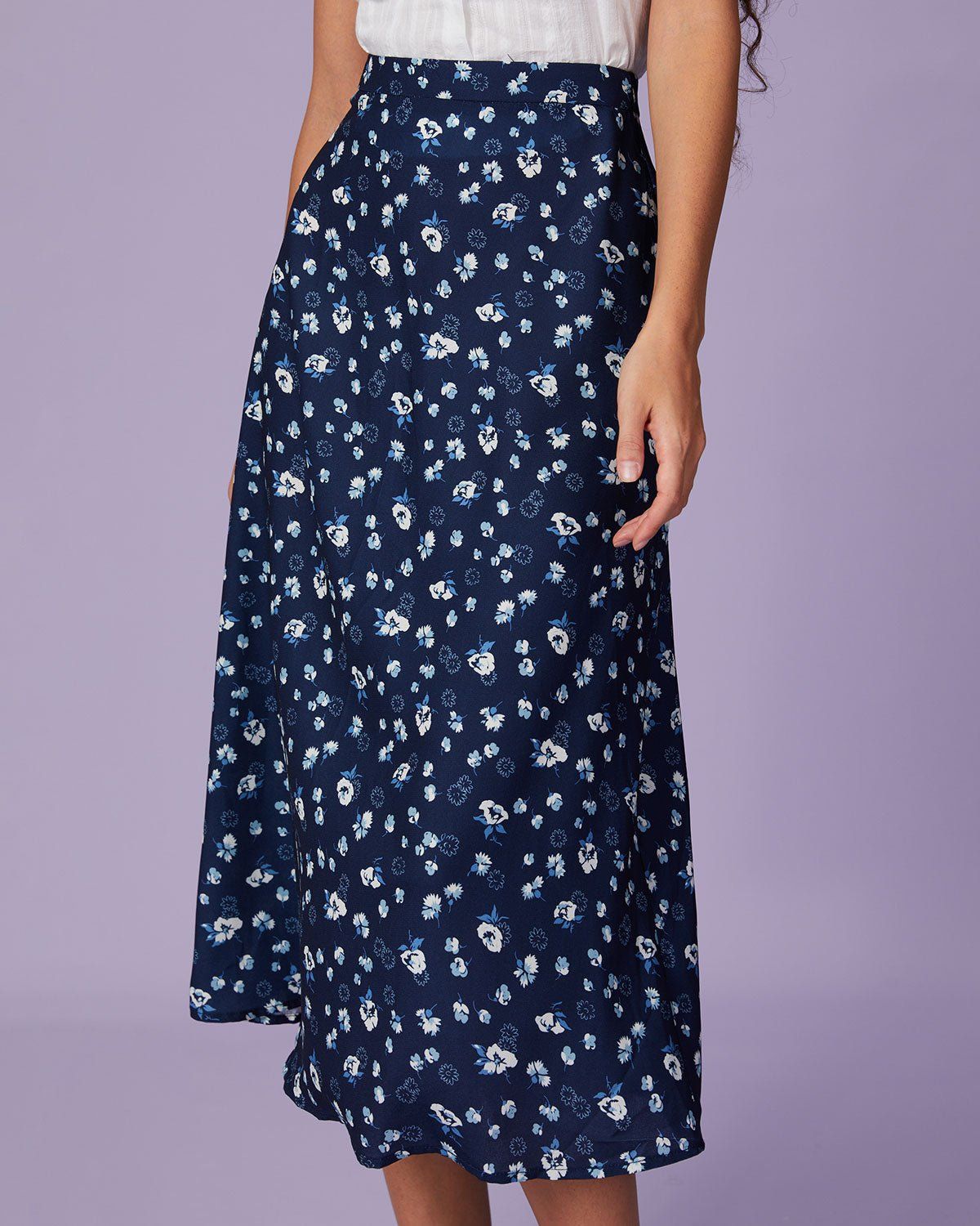 The Navy High Waisted Floral Zip Midi Skirt sold by rihoas product image thumbnail 2