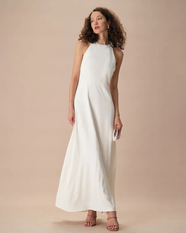 The White Bowknot Halter Maxi Dress sold by rihoas