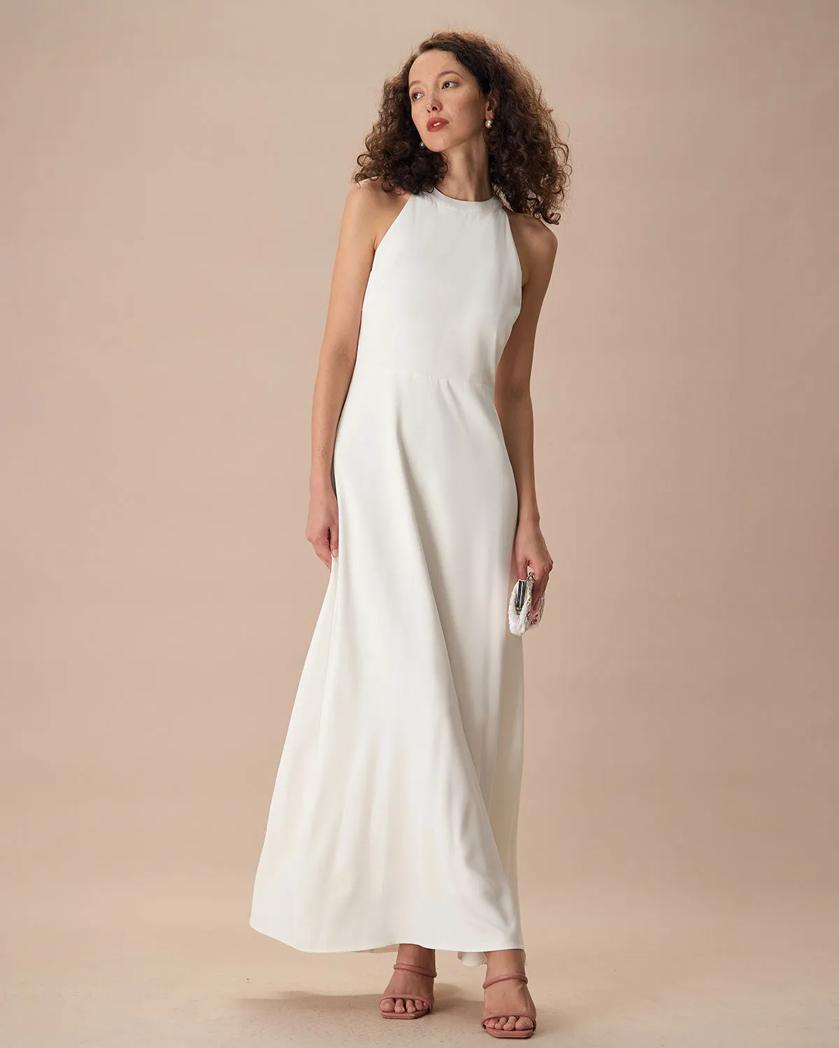 The White Bowknot Halter Maxi Dress sold by rihoas